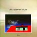 Jan Garbarek Group - Photo With Blue Sky, White Cloud, Wires, Windows And A Red Roof